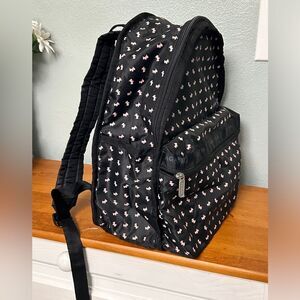 Agatha Paris Black Backpack With Pink Scottie Dog Pattern all over.